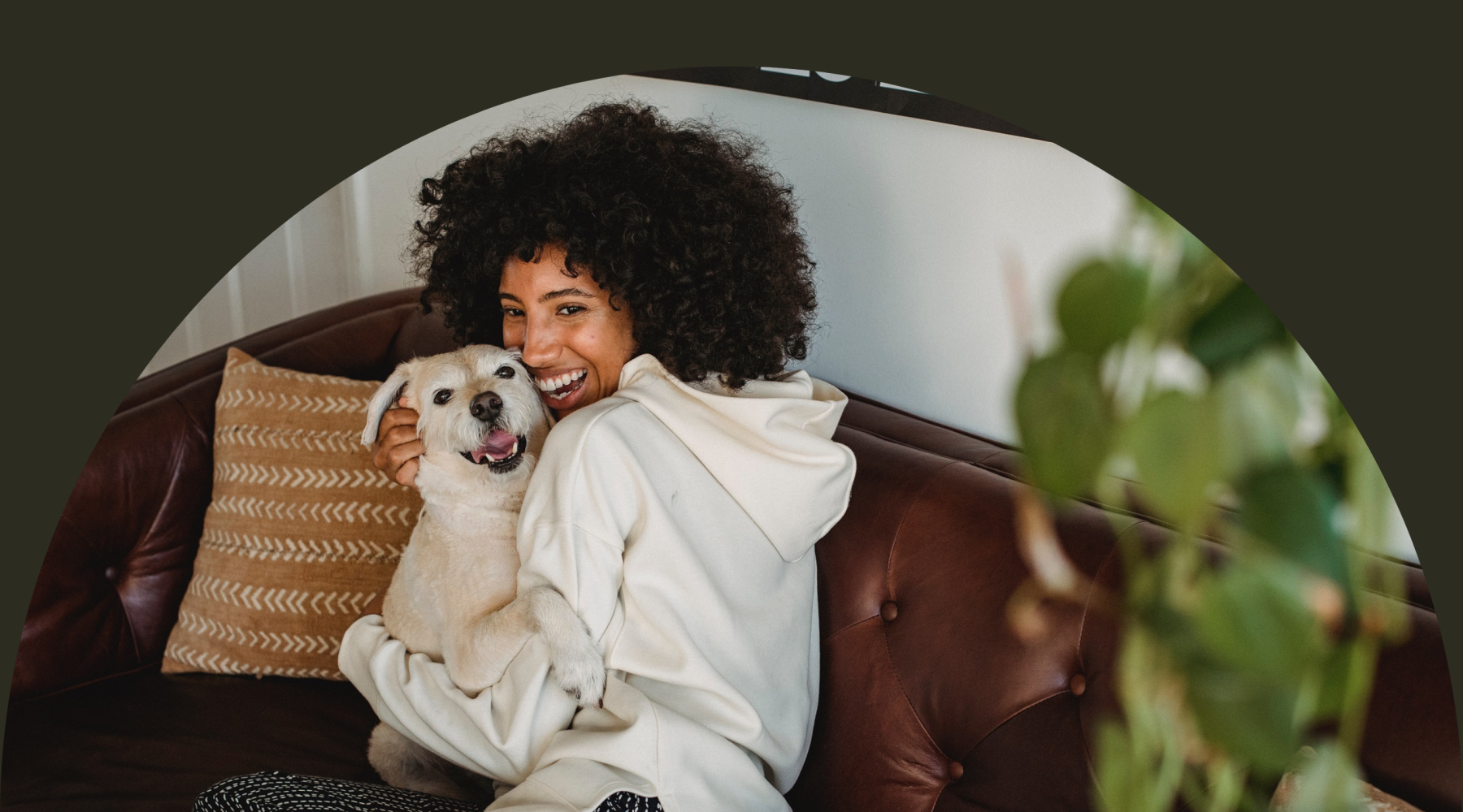 a woman holding a dog